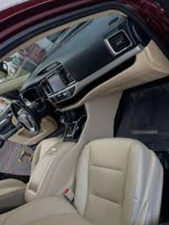Freshly detailed light-colored vehicle interior